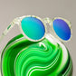 Óculos de Sol Perfomance Polarizado Redondo Armação Transparente com Verde - Marble Arts Master