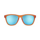 Óculos de sol Goodr Brasil Donkey Goggles com armação laranja quadrada e lentes azuis espelhadas polarizadas.