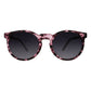 Óculos de sol Goodr Brasil modelo Circle G com armação redonda rosa estampada e lentes pretas polarizadas.