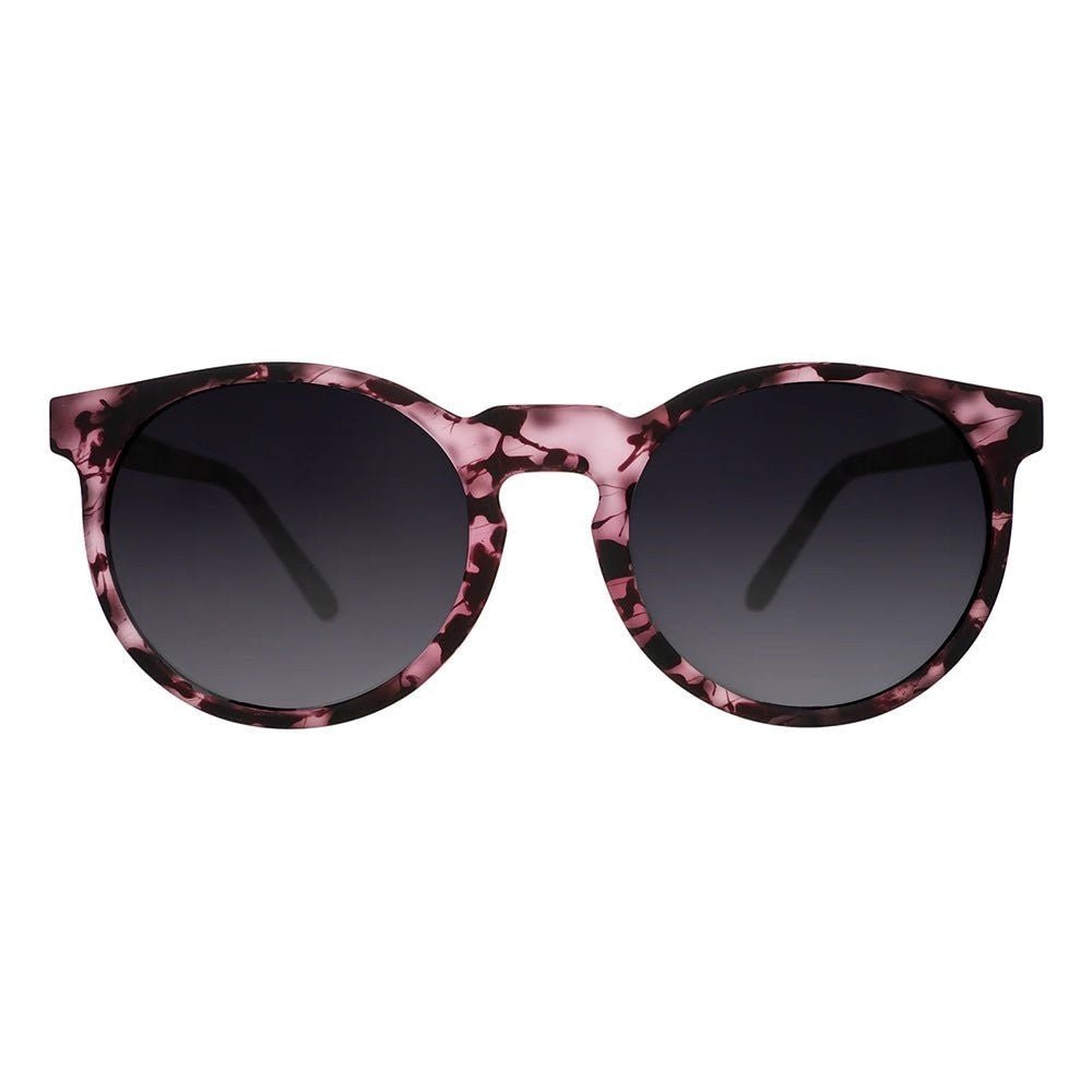 Óculos de sol Goodr Brasil modelo Circle G com armação redonda rosa estampada e lentes pretas polarizadas.
