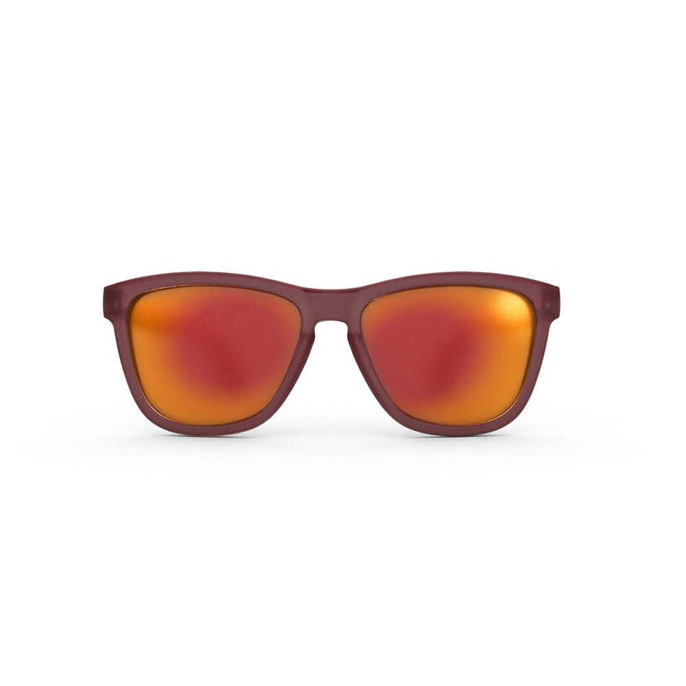 Óculos de sol vermelho unissex com armação quadrada e lente rosa espelhada, polarizada com proteção UV400. O acessório é leve, confortável e não escorrega ou pula no rosto ao realizar esportes.