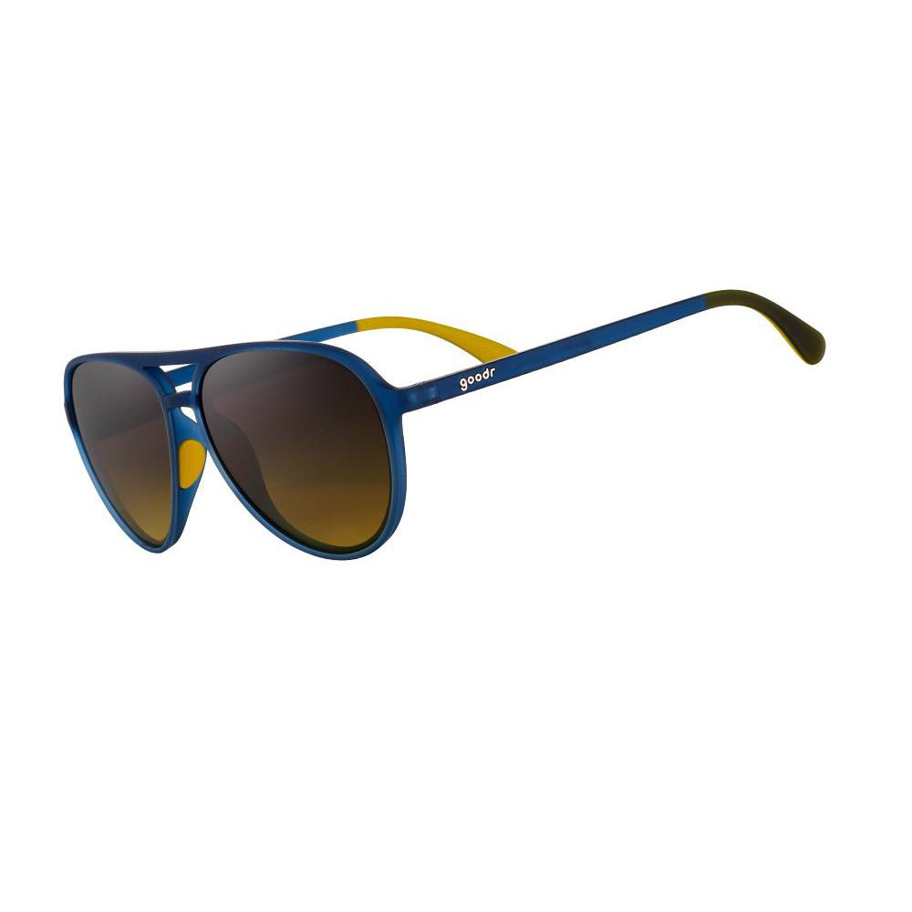 Óculos de sol azul marinho unissex com armação aviador e lente marrom degradê não refletiva, polarizada com proteção UV400. O acessório é leve, confortável e não escorrega ou pula no rosto ao realizar esportes.